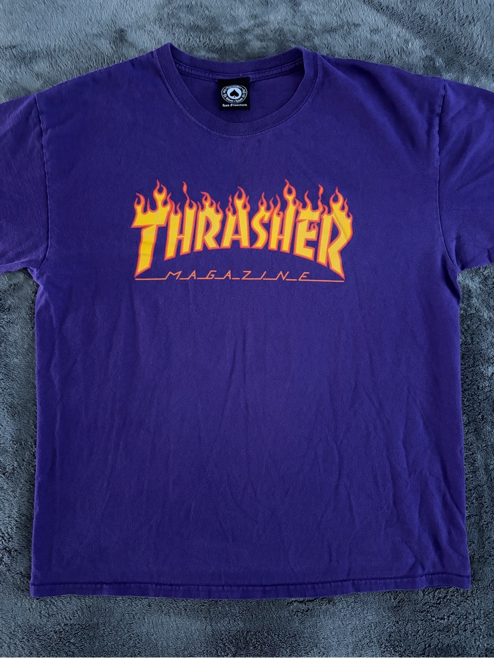Thrasher Purple Tee with Yellow-Orange Flame Logo